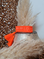 GEWEBTES STOFFARMBAND *LOVE* ORANGE